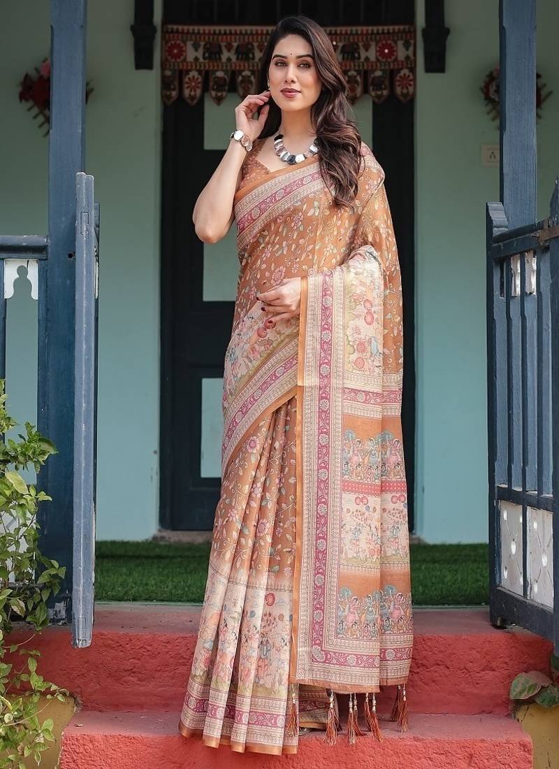 Brown handloom cotton-linen saree with floral motifs and rich zari border