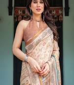 Ivory with floral prints linen cotton handloom printed saree, festive procession pallu, and tassels