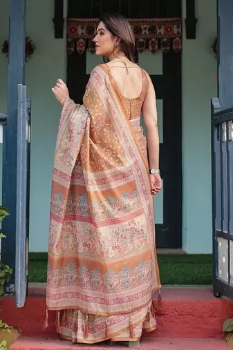 Brown handloom cotton-linen saree with floral motifs and rich zari border