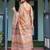 Brown handloom cotton-linen saree with floral motifs and rich zari border