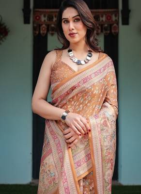 Brown handloom cotton-linen saree with floral motifs and rich zari border 1