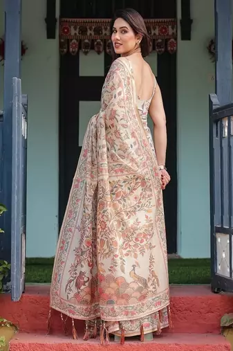 Elegant beige handloom cotton-linen saree with golden zari weave, floral printed pallu & tassel detailing