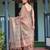 Earthy brown handloom cotton-linen saree with bird motifs and striped detailing