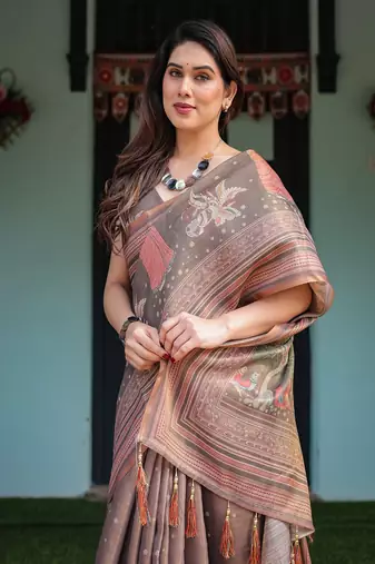 Earthy brown handloom cotton-linen saree with bird motifs and striped detailing