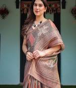 Earthy brown handloom cotton-linen saree with bird motifs and striped detailing