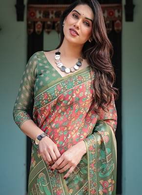 Bottel green handloom cotton-linen saree with elephant motifs and floral detailing 1