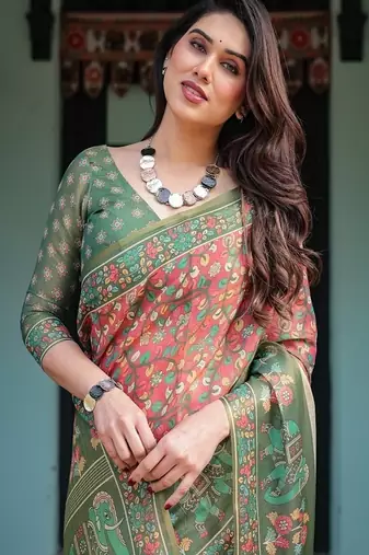 Bottel green handloom cotton-linen saree with elephant motifs and floral detailing