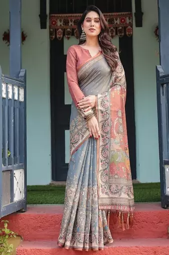 Smoky grey handloom cotton-linen saree with vibrant folk motifs and floral pallu