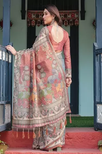 Smoky grey handloom cotton-linen saree with vibrant folk motifs and floral pallu