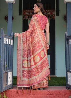 Brick red handloom cotton-linen saree with mythological motifs and floral border 2