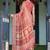 Brick red handloom cotton-linen saree with mythological motifs and floral border