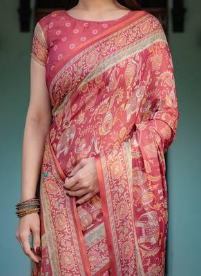 Brick red handloom cotton-linen saree with mythological motifs and floral border 4