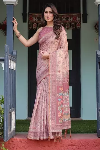 Dusty pink handloom cotton-linen saree with floral motifs and artistic pallu