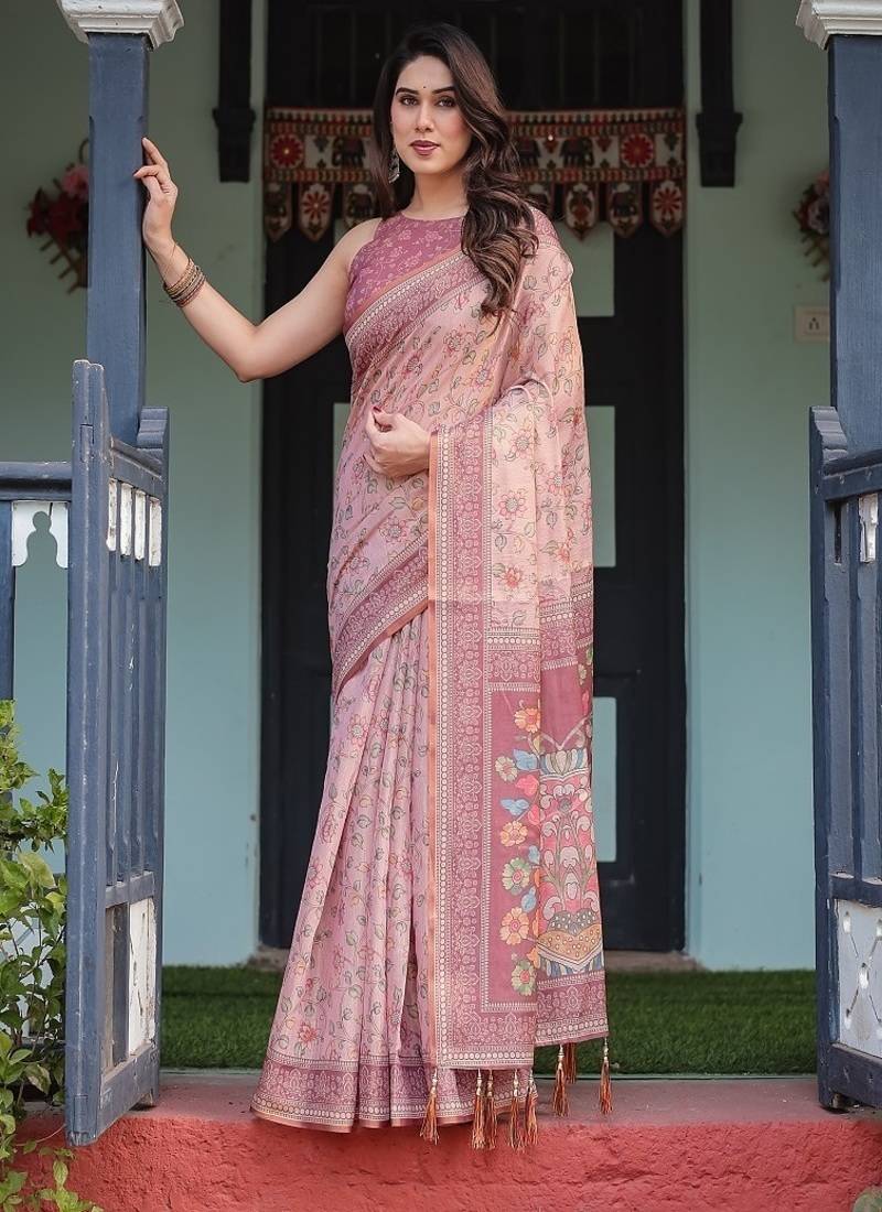 Dusty pink handloom cotton-linen saree with floral motifs and artistic pallu