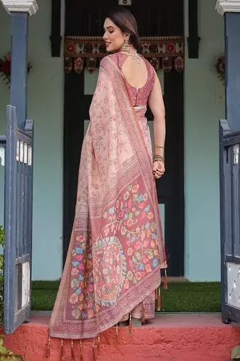 Dusty pink handloom cotton-linen saree with floral motifs and artistic pallu