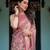 Dusty pink handloom cotton-linen saree with floral motifs and artistic pallu