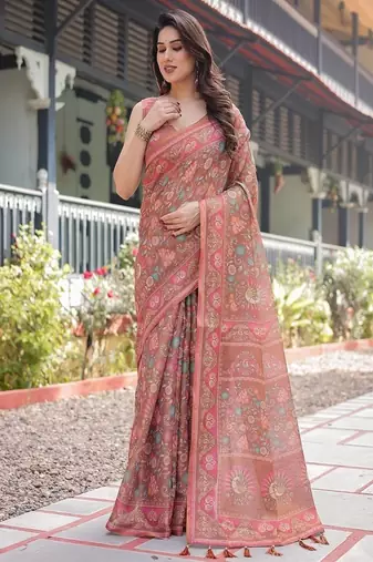 Copper brown handloom cotton-linen saree with floral motifs and vibrant pink accents