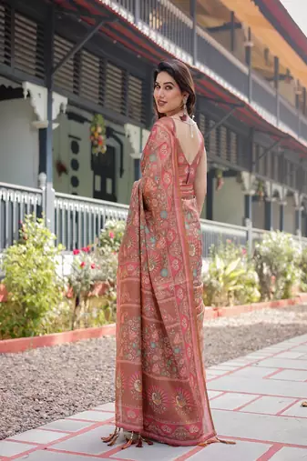 Copper brown handloom cotton-linen saree with floral motifs and vibrant pink accents