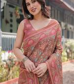 Copper brown handloom cotton-linen saree with floral motifs and vibrant pink accents