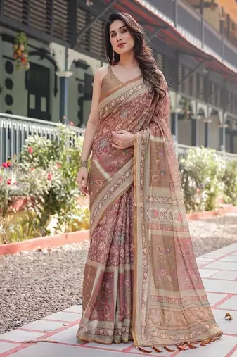 Rust and gold handloom cotton-linen saree with floral motifs and rich zari border