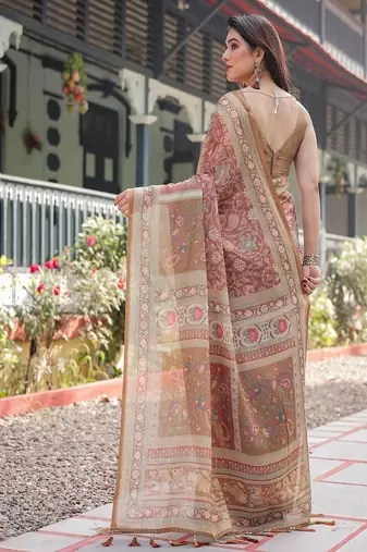 Rust and gold handloom cotton-linen saree with floral motifs and rich zari border