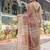 Rust and gold handloom cotton-linen saree with floral motifs and rich zari border