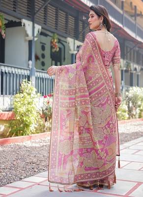 Regal pink handloom cotton-linen saree with floral motifs, golden zari highlights, and tassel detailing 3
