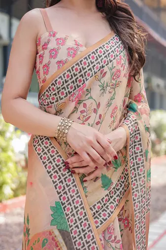 Beige handloom cotton-linen saree with elephant motifs and geometric border design