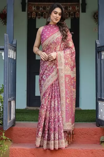 Pink handloom cotton-linen saree with gold floral motifs and peacock pallu