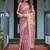 Pink handloom cotton-linen saree with gold floral motifs and peacock pallu