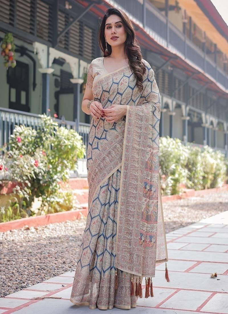 Classic beige handloom cotton-linen saree with madhubani-inspired prints and zari highlights