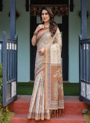 Ivory handloom cotton-linen saree with floral and peacock motifs, zari highlights, and tassel finish 2