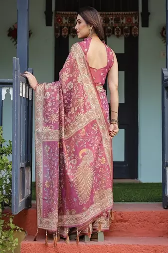 Pink handloom cotton-linen saree with gold floral motifs and peacock pallu