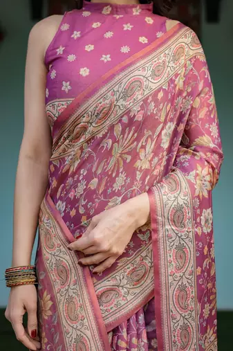 Pink handloom cotton-linen saree with gold floral motifs and peacock pallu