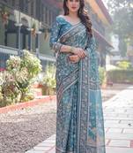 Pure handloom teal blue saree with multicolor floral vine print & tassel pallu