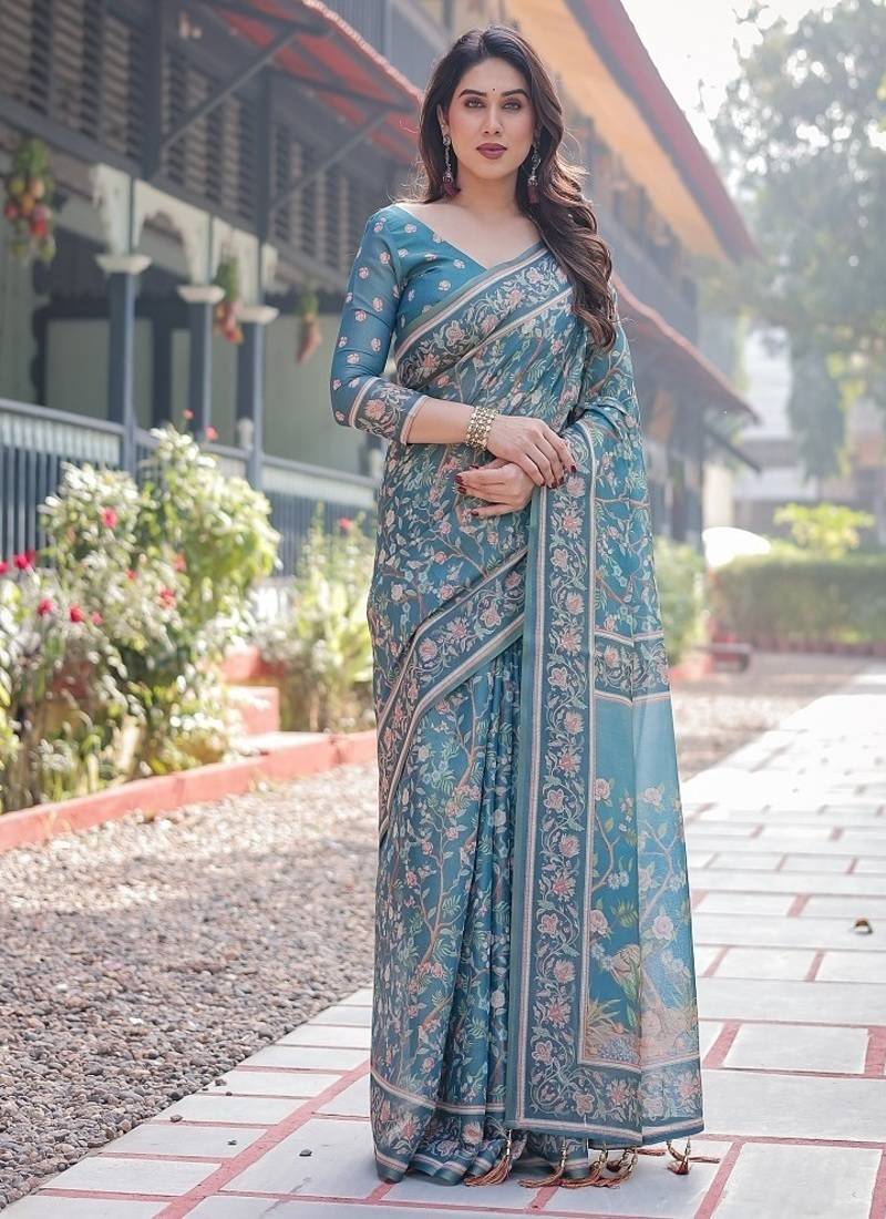 Pure handloom teal blue saree with multicolor floral vine print & tassel pallu