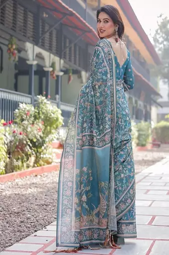 Pure handloom teal blue saree with multicolor floral vine print & tassel pallu