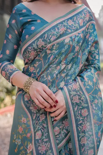 Pure handloom teal blue saree with multicolor floral vine print & tassel pallu