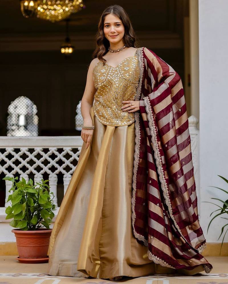 gold banarasi viscose lehenga choli with mirror work
