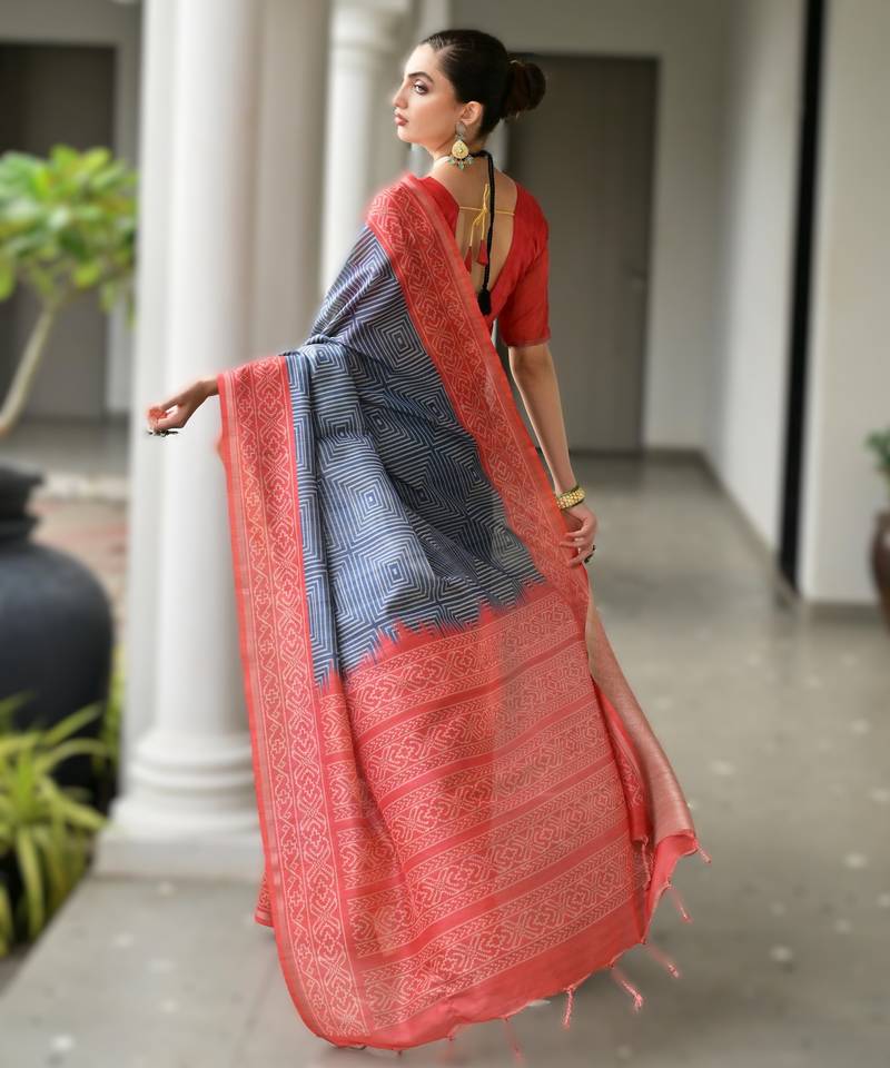 Navy blue soft desi tussar silk saree with unique ikkat painted design & traditional pallu