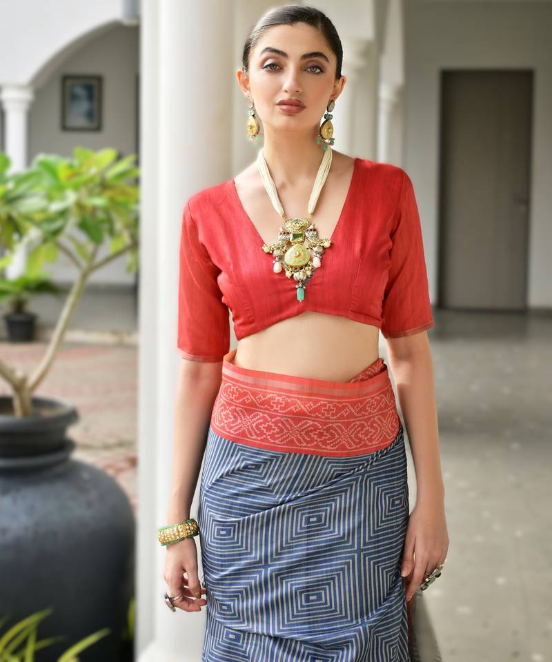 Navy blue soft desi tussar silk saree with unique ikkat painted design & traditional pallu