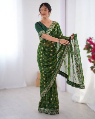 Green floral printed georgette chiffon saree with foil work & embroidered lace border 1