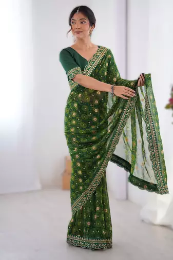 Green floral printed georgette chiffon saree with foil work & embroidered lace border