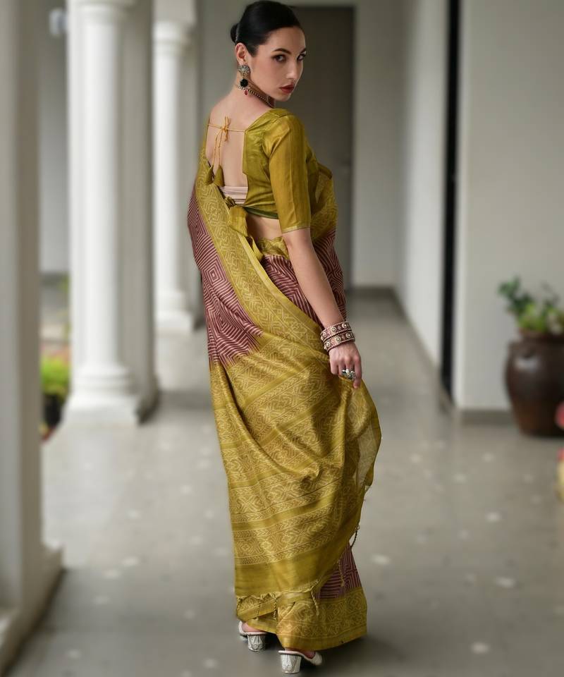 Maroon soft desi tussar silk saree with unique ikkat painted design & traditional pallu