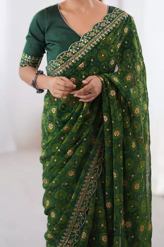 Green floral printed georgette chiffon saree with foil work & embroidered lace border