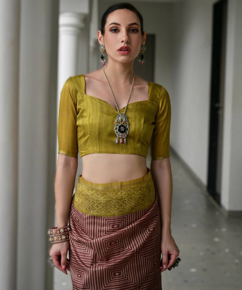 Maroon soft desi tussar silk saree with unique ikkat painted design & traditional pallu