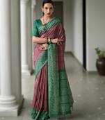 Maroon soft desi tussar silk saree with unique ikkat painted design & traditional pallu