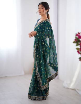 Teal floral printed georgette chiffon saree with foil work & embroidered lace border 3