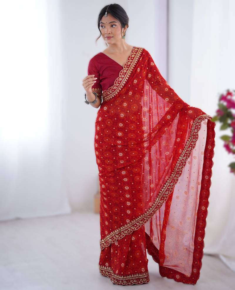 Red floral printed georgette chiffon saree with foil work & embroidered lace border