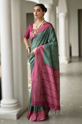 Green soft desi tussar silk saree with unique ikkat painted design & traditional pallu